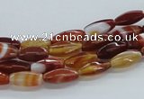 CAB480 15.5 inches 5*12mm faceted rice red agate beads wholesale
