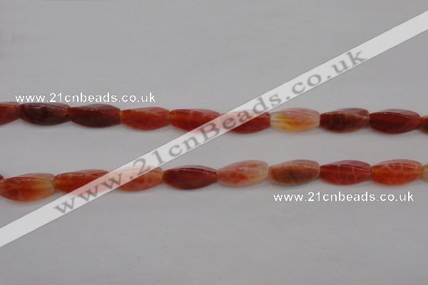 CAG4201 7*14mm faceted & twisted trihedron natural fire agate beads