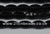 CAG6029 15.5 inches 6*10mm faceted rice matte black agate beads