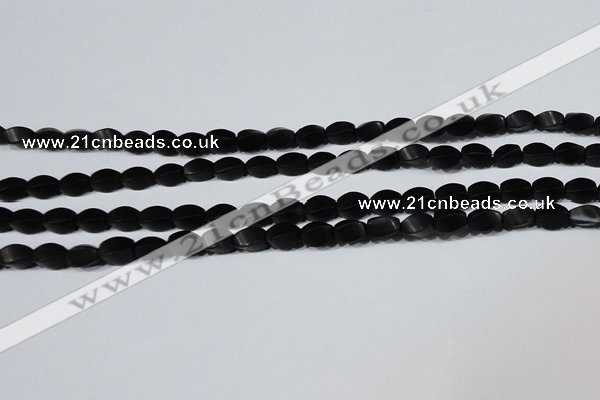 CAG6040 15.5 inches 5*8mm twisted rice matte black agate beads