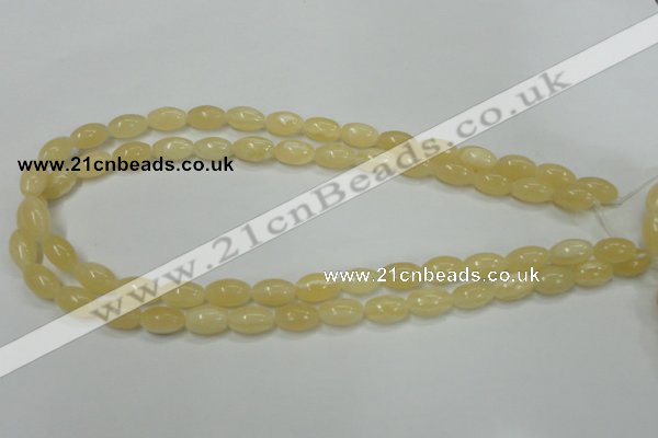 CCA208 15.5 inches 8*12mm rice yellow lace calcite beads