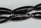 CJB54 15.5 inches 10*30mm rice natural jet gemstone beads