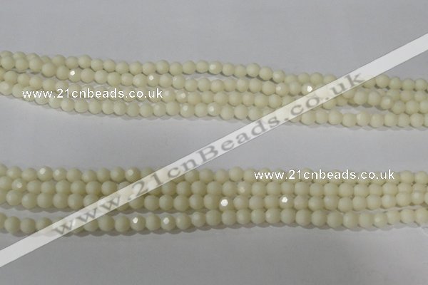 CTU1440 15.5 inches 4mm faceted round synthetic turquoise beads
