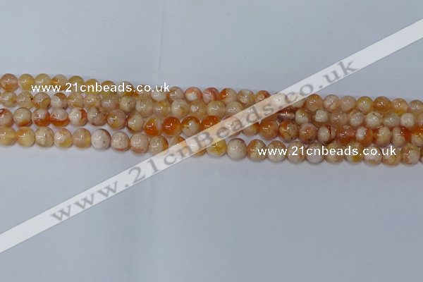 CAA1071 15.5 inches 6mm round sakura agate gemstone beads