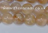 CAA1073 15.5 inches 10mm round sakura agate gemstone beads