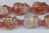 CAA1183 15.5 inches 15*20mm carved calabash sakura agate beads