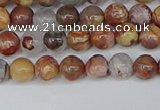 CAA1220 15.5 inches 4mm round gold mountain agate beads