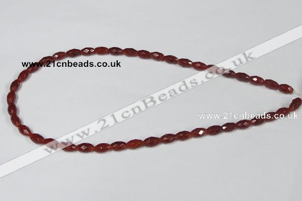 CAA124 15.5 inches 6*10mm faceted rice red agate gemstone beads