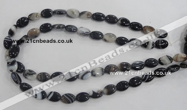 CAA210 15.5 inches 10*14mm oval madagascar agate beads