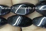 CAA2482 15.5 inches 6*12mm twisted rice black agate beads