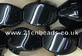 CAA2486 15.5 inches 10*14mm twisted rice black agate beads