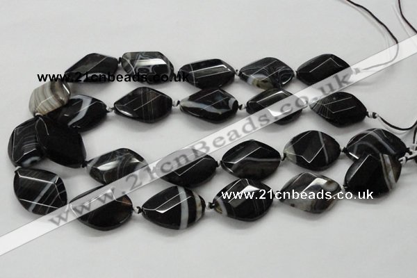 CAA286 22*30mm twisted & faceted oval black line agate beads
