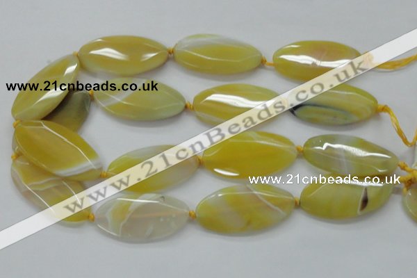 CAA325 15.5 inches 25*50mm faceted marquise yellow line agate beads