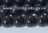 CAA3660 15.5 inches 6mm round matte & carved black agate beads