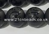 CAA3678 15.5 inches 12mm round matte & carved black agate beads