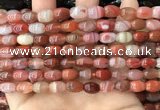 CAA4567 15.5 inches 7*10mm - 8*11mm rice south red agate beads