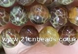 CAA5036 15.5 inches 4mm round yellow dragon veins agate beads