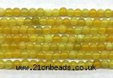 CAA6276 15 inches 4mm round yellow fire agate beads