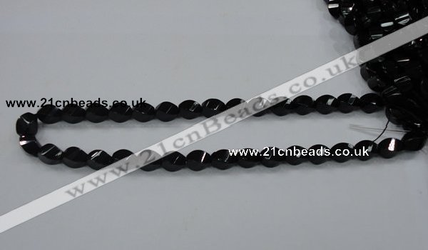 CAB335 15.5 inches 8*12mm faceted & twisted rice black agate beads
