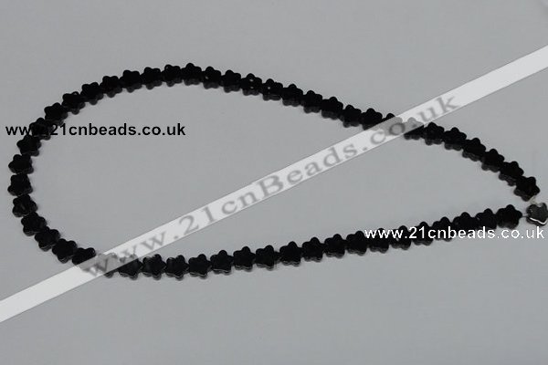 CAB987 15.5 inches 8*8mm star black agate gemstone beads wholesale