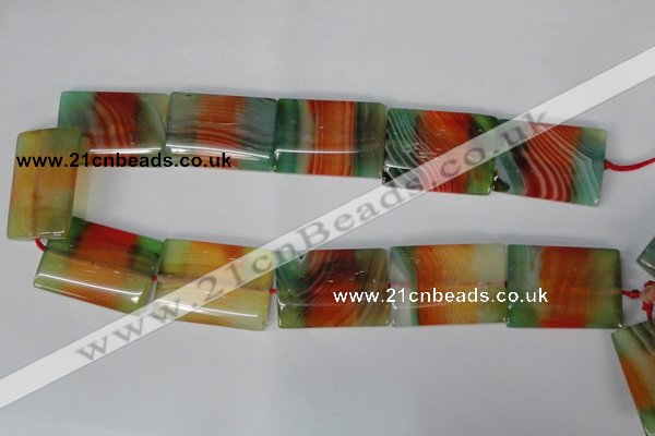 CAG1057 15.5 inches 25*35mm flat tube rainbow agate beads