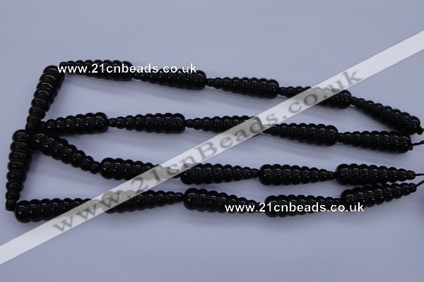 CAG1697 15.5 inches 10*35mm carved teardrop black agate beads