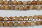 CAG1885 15.5 inches 6mm faceted round lemon crazy lace agate beads