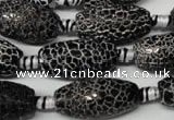CAG2295 15.5 inches 13*25mm faceted rice fire crackle agate beads