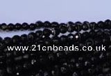 CAG2312 15.5 inches 4mm faceted round black line agate beads