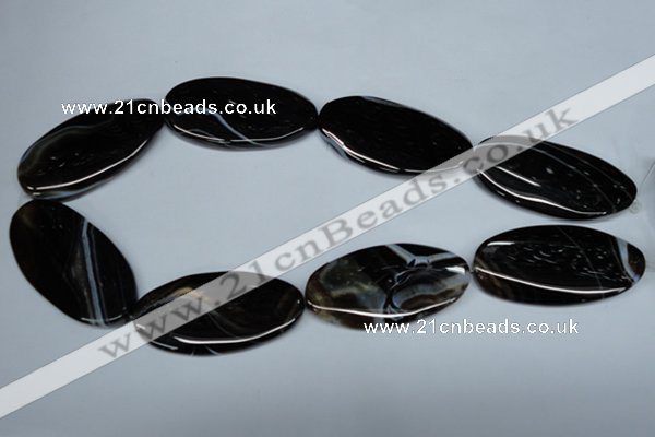 CAG3015 15.5 inches 25*50mm twisted oval black line agate beads