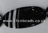 CAG3086 15.5 inches 25*50mm faceted oval black line agate beads