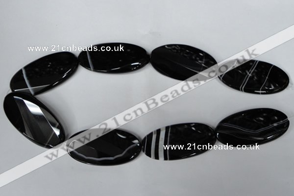 CAG3086 15.5 inches 25*50mm faceted oval black line agate beads