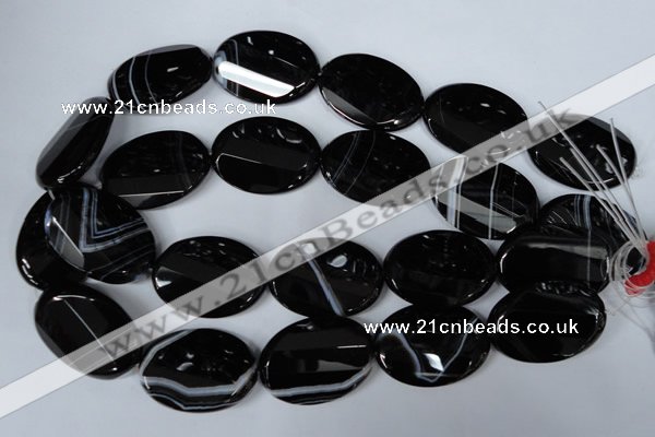 CAG3087 15.5 inches 25*35mm faceted oval black line agate beads
