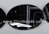 CAG3088 15.5 inches 30*40mm faceted oval black line agate beads