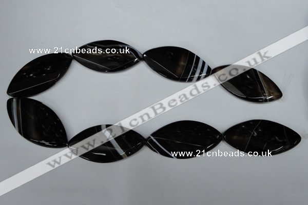 CAG3095 15.5 inches 25*50mm faceted & twisted oval black line agate beads