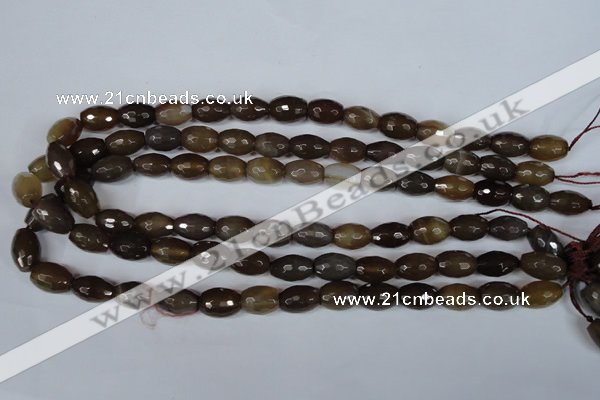 CAG3129 15.5 inches 10*14mm faceted rice brown line agate beads