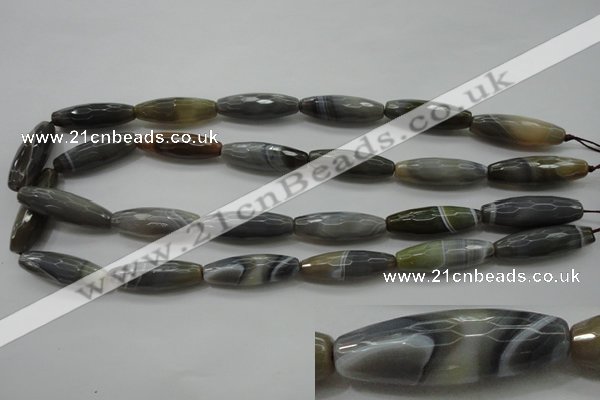 CAG3958 15.5 inches 10*30mm faceted rice grey botswana agate beads