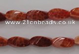 CAG4181 15.5 inches 7*14mm faceted & twisted rice natural fire agate beads