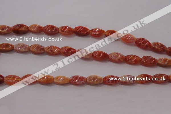 CAG4185 15.5 inches 6*12mm twisted rice natural fire agate beads