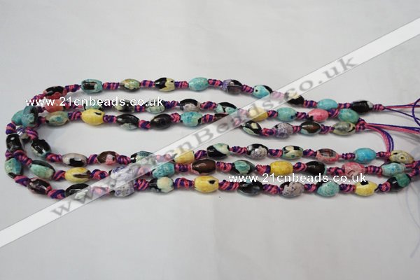 CAG5770 15 inches 6*9mm faceted rice fire crackle agate beads