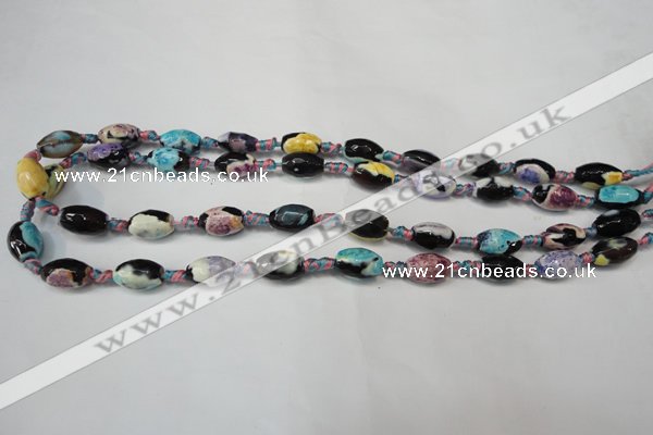 CAG5772 15 inches 8*12mm faceted rice fire crackle agate beads