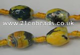 CAG5774 15 inches 10*14mm faceted rice fire crackle agate beads