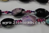 CAG5775 15 inches 10*14mm faceted rice fire crackle agate beads