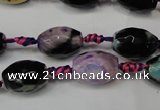 CAG5775 15 inches 10*14mm faceted rice fire crackle agate beads