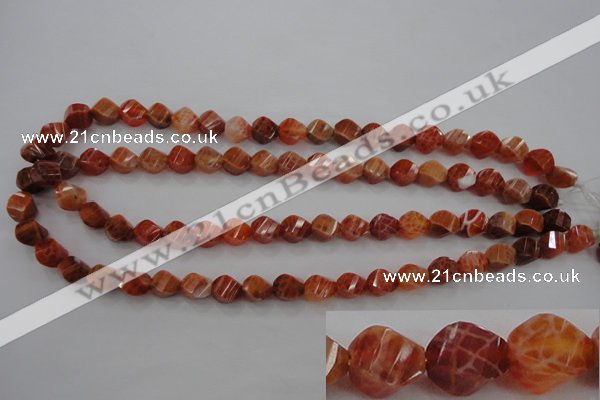 CAG580 15.5 inches 8*10mm faceted & twisted rice natural fire agate beads