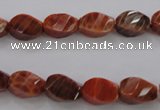 CAG581 15.5 inches 8*12mm faceted & twisted rice natural fire agate beads