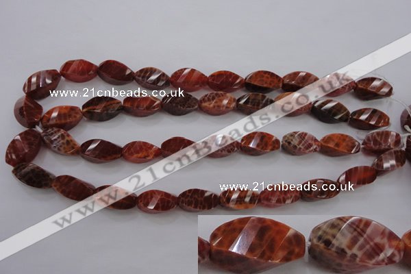 CAG583 15.5 inches 10*20mm faceted & twisted rice natural fire agate beads
