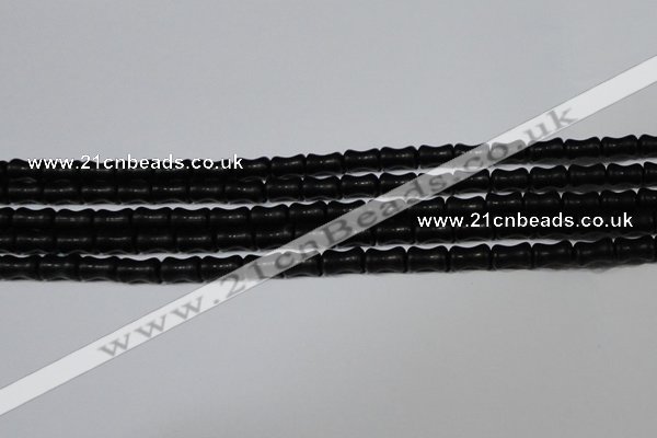 CAG6038 15.5 inches 4*8mm bone matte black agate beads