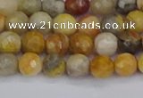 CAG9868 15.5 inches 4mm faceted round yellow crazy lace agate beads