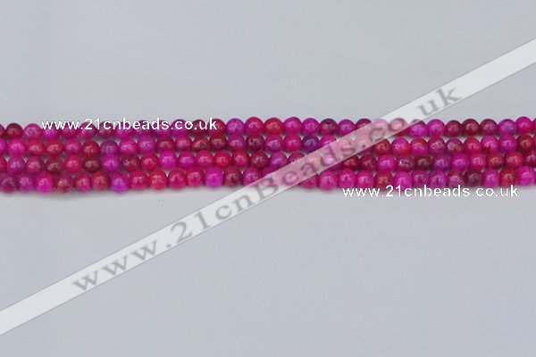 CAG9924 15.5 inches 4mm round fuchsia crazy lace agate beads